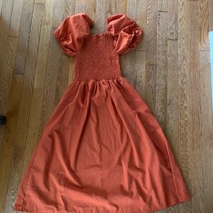 Women’s juniors burnt umber orange midi smocked dress